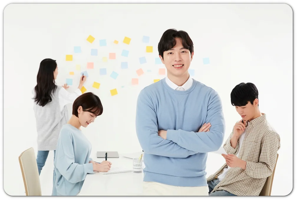 메모지가 붙은 벽 앞에서 학습을 돕는 어른